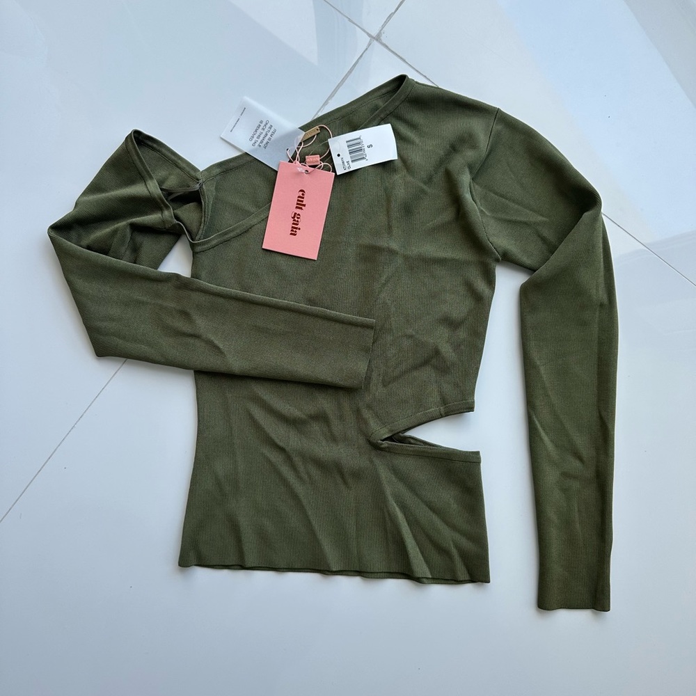 Green top with cut out .